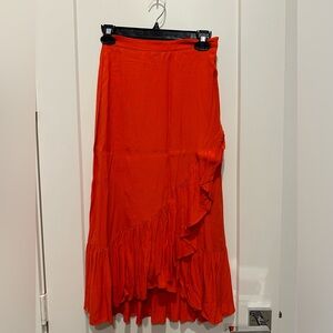 H&M orange wrap skirt, size 4, gently used with ruffle detail. Great condition!